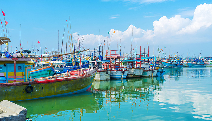 Fishing boats sailed in the waters in Mirissa, Sri Lanka