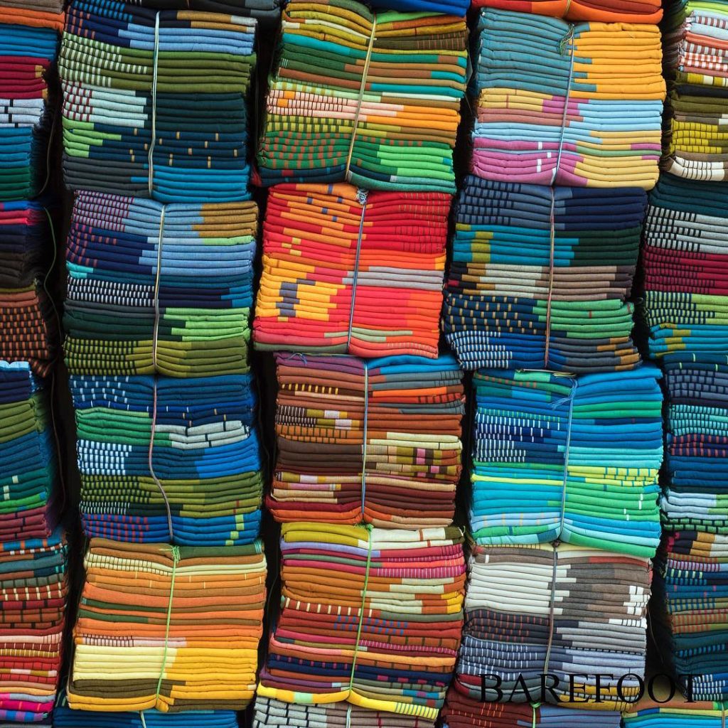 Stacks of colourful handloom products at Barefoot Ceylon, Sri Lanka | Photo Credit: Barefoot Ceylon